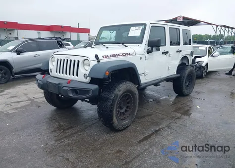 2014 Jeep Wrangler Unlimited Rubicon из США, поврежденный, VIN 1C4HJWFG4EL104827